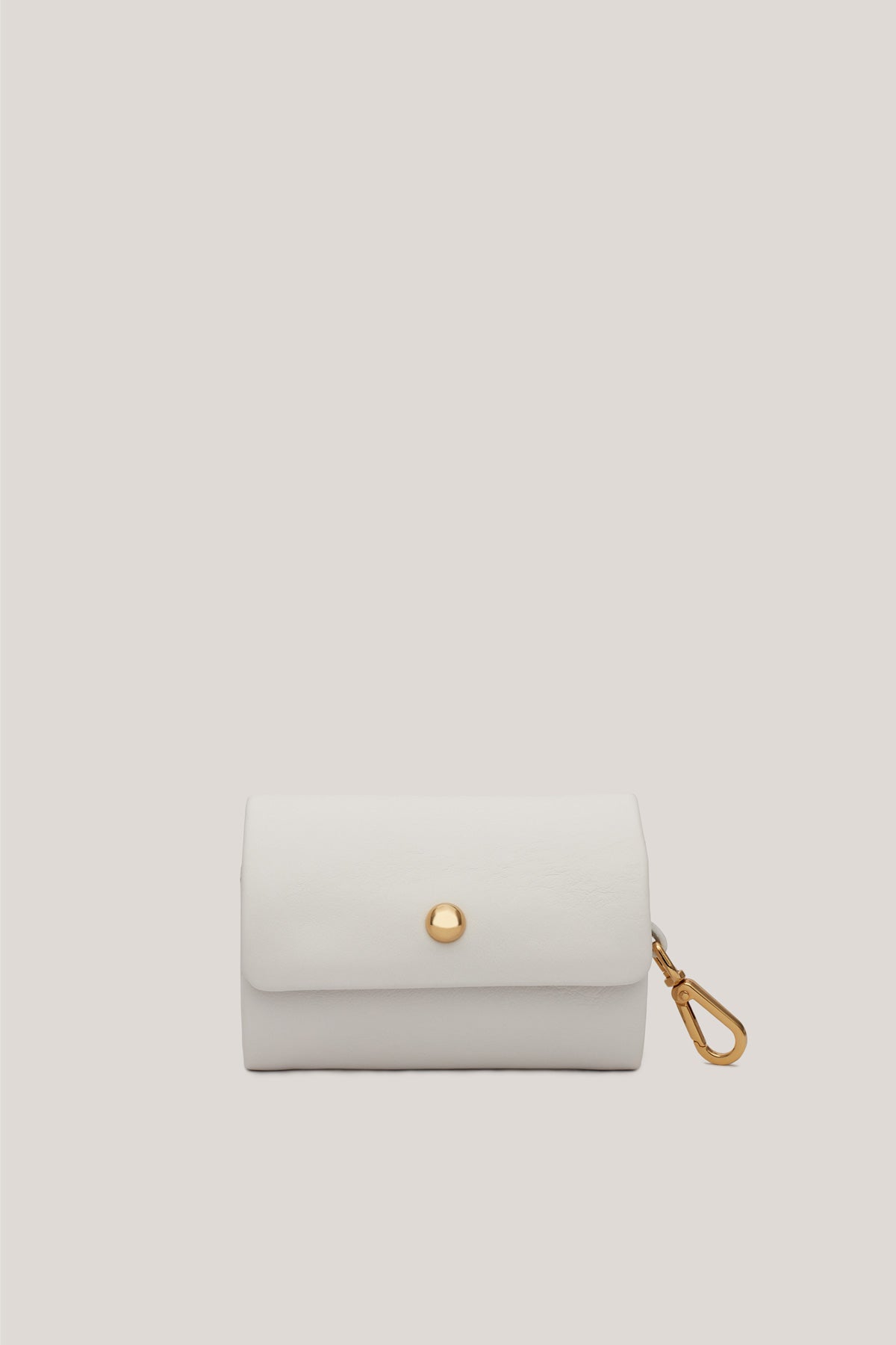 A white elegant coin purse made of quality and luxurious leather